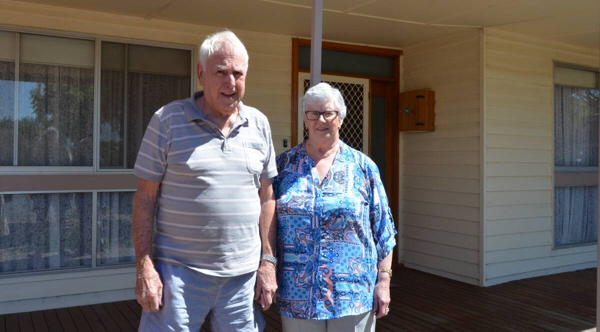 LIFELONG LOVE: Pat and Graeme Wignall outside their Murtoa home, still holding hands. Picture: ALISON FOLETTA.