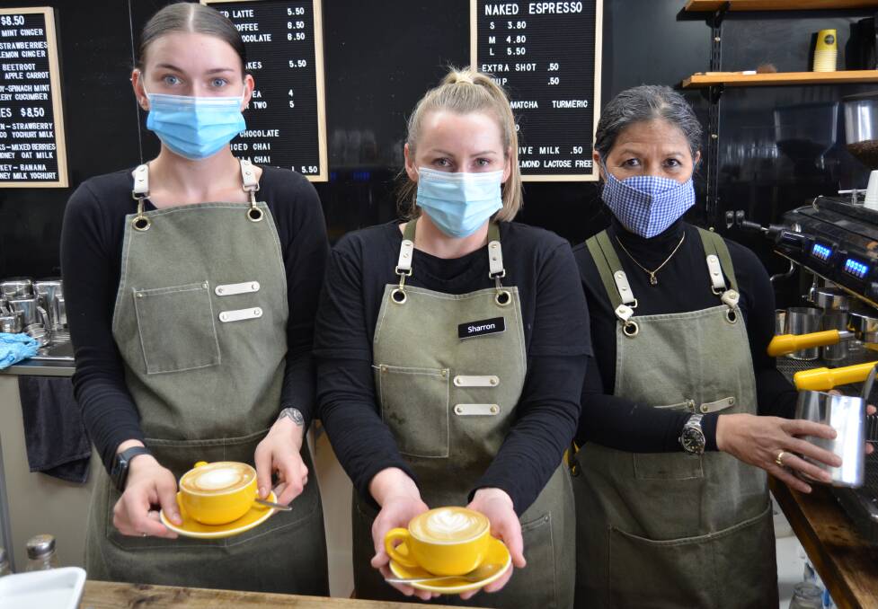 BUZZING: Farmhouse Cafe was flat out over the weekend, Kyla Lawes, Sharron Keating and Lulu Langley were excited to see Horsham reopen this weekend. Picture: ALISON FOLETTA