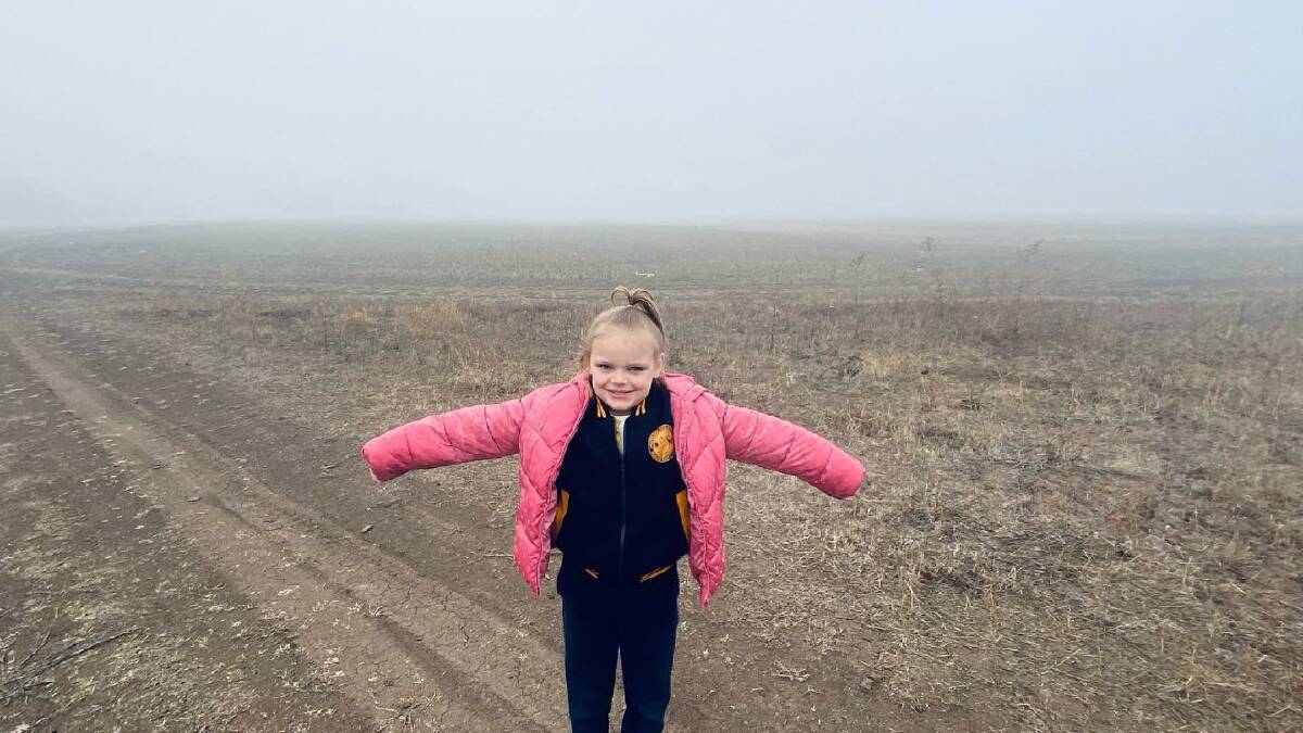 CHILL: Hayley Walker, 6, on her way to school on a cold and foggy morning. Picture: CONTRIBUTED 