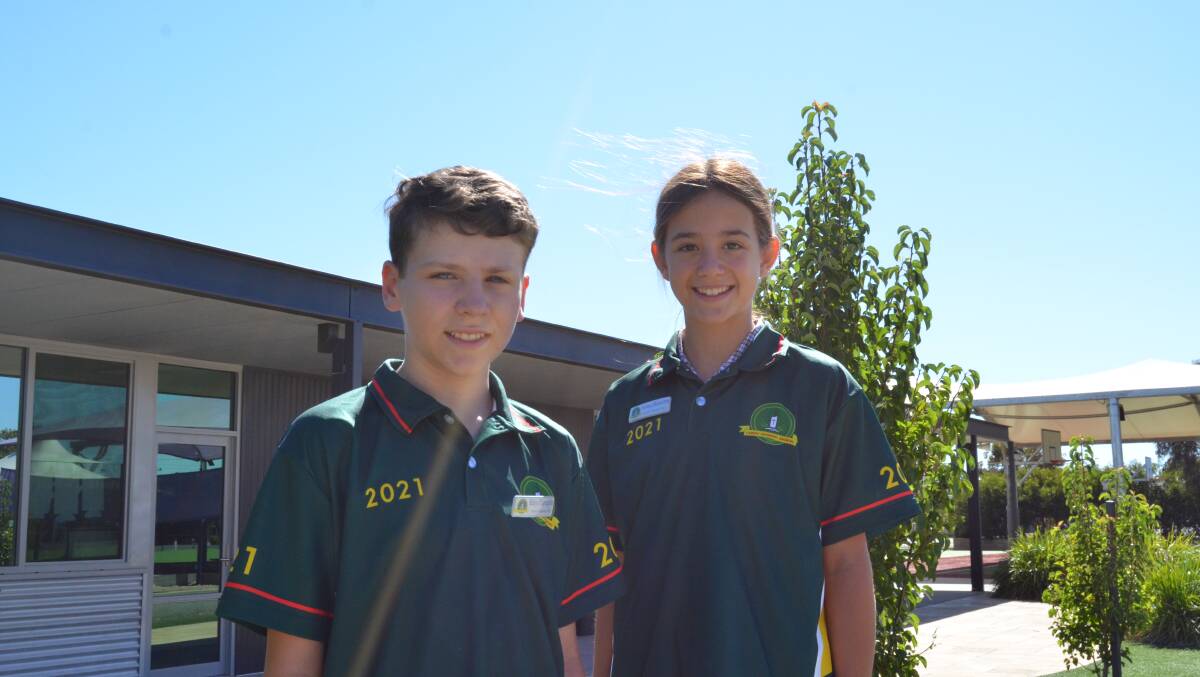 SCHOOL SUPPORT: Ss Michael and John's Primary School captains Riley O'Loughlin and Sienna Manserra. Picture: ALISON FOLETTA. 