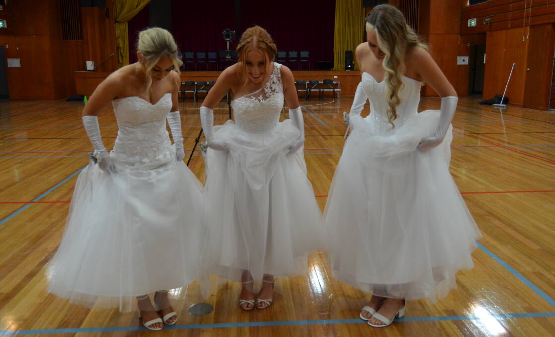 TO THE NINES: Holly Nuske, Hailey Puls and Ruby Hill are year 12 students all ready for their debutante ball. Picture: ALISON FOLETTA.