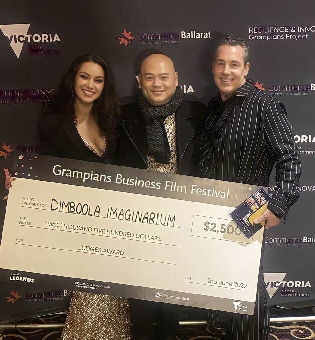WINNERS: Chan and Jamie Uoy with the cheque presented to the Dimboola Imaginarium after winning the short film festival. Picture: CONTRIBUTED
