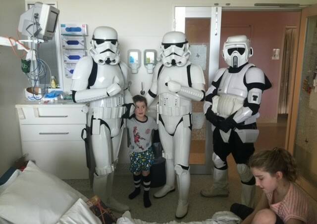 SPECIAL VISIT: Star Wars stormtroopers visit Fletcher in his room at the Royal Children's Hospital. Picture: CONTRIBUTED
