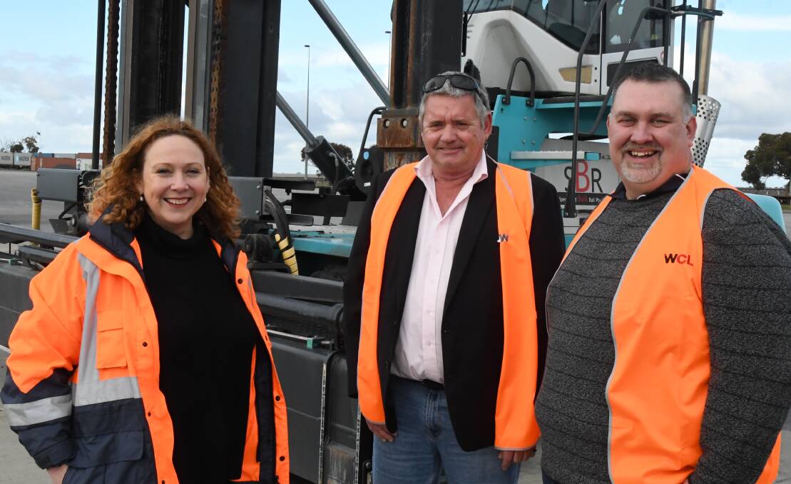 INCENTIVE SCHEME: Melissa Horne with Wimmera Container Line operations manager Craig Scott (left) and WIM PAK general manager James French. Picture: ALEX DALZIEL