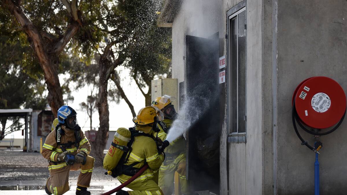 STRUCTURE: Firefighters were trained in how to best handle the toxic smoke created from structure fires. Picture: Bronwyn Hastings