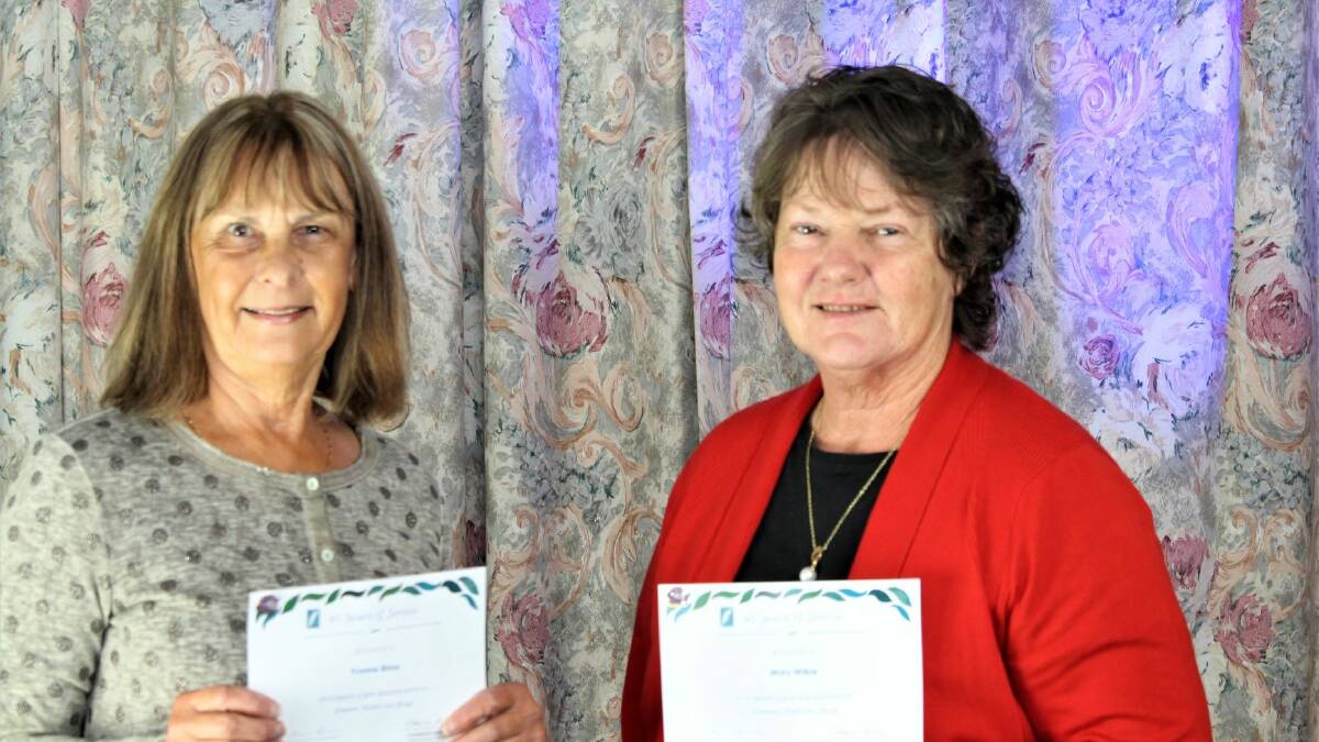 SERVICE: Yvonne Binns (left) and Mary Wilkie with their 45 years of service awards. Picture: CONTRIBUTED