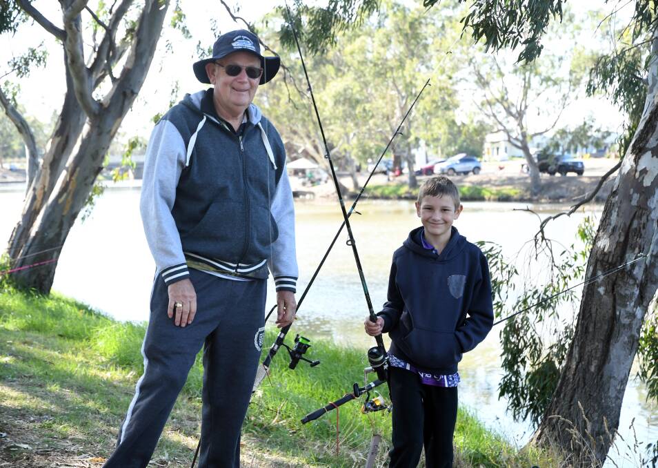 ANGLERS: Geoff (left) and Troy Marland at last years fishing competition. Picture: MATT CURRILL