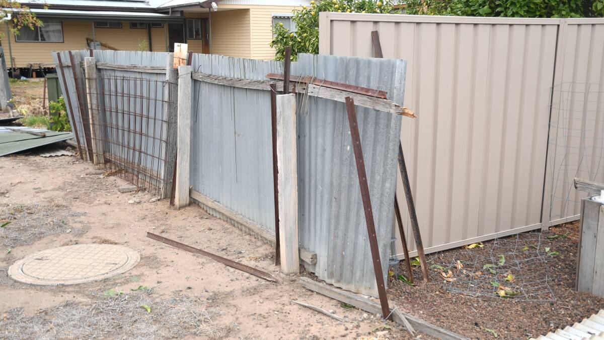 DAMAGE: Part of Mr Henry's partially damaged fence. Picture: ALEX DALZIEL