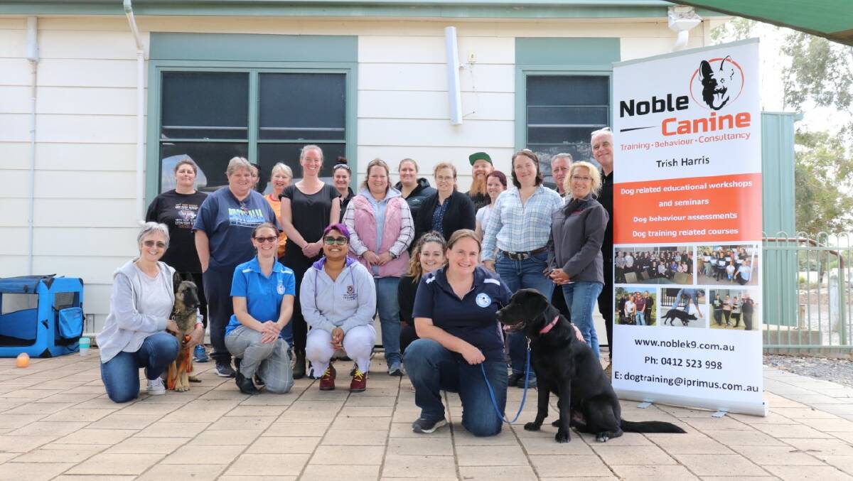 CANINE: The training group with instructor Trish Cavarro at Haven Hall. Picture: CONTRIBUTED