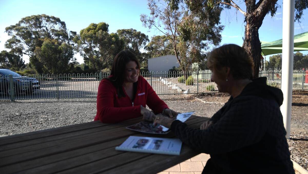 PLANNING: Lisa Fulton (left) and Sue Exell discuss the 2014 draft precinct plan for Haven Recreation Reserve. Picture: ALEX DALZIEL