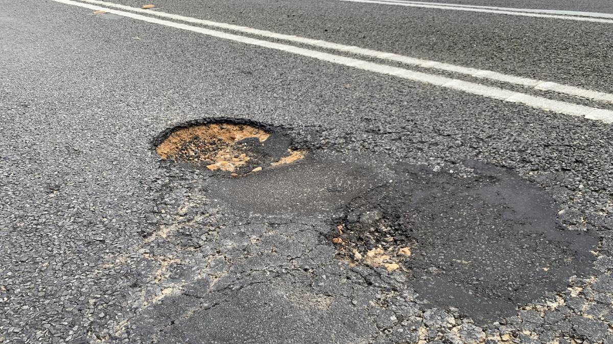 POTHOLES: The state of the road near Deep Lead on the Western Highway. Picture: TALLIS MILES