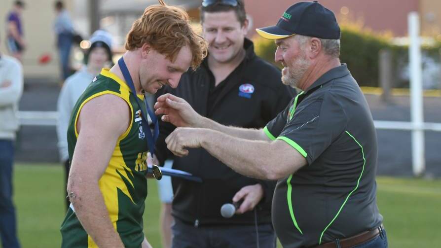 PASSION: Mellington presents Eric Guthrie with the medal for best on ground in the HDFNL's interleague victory over Loddon Valley in 2019. Picture: FILE