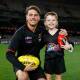 STARSTRUCK: Horsham's Archie Stockdale, pictured with his favourite Essendon player Archie Perkins on Saturday night. Picture: AFL PHOTOS
