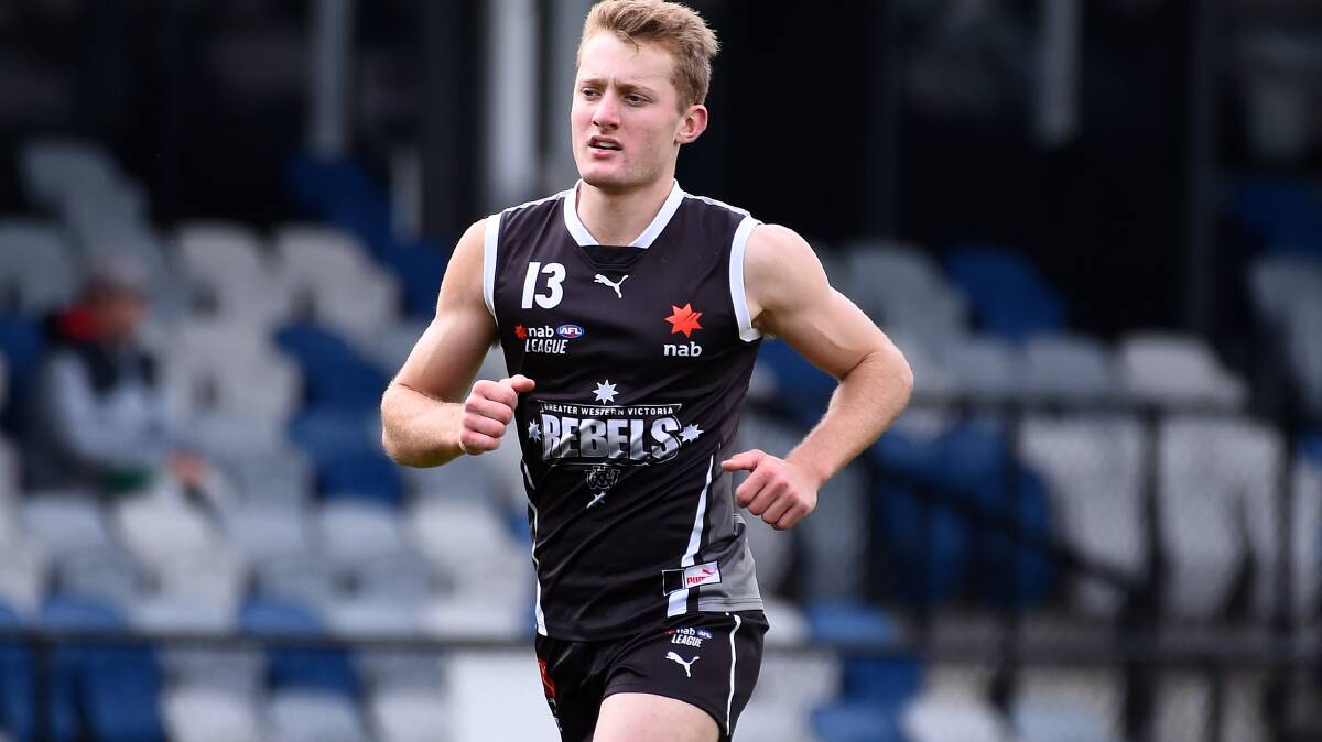 PREPARATION: Horsham's Sam Breuer warms up before his GWV Rebels NAB League clash with the Geelong Falcons, in Ballarat over the weekend. The Rebels narrowly went down in the end. Picture: ADAM TRAFFORD