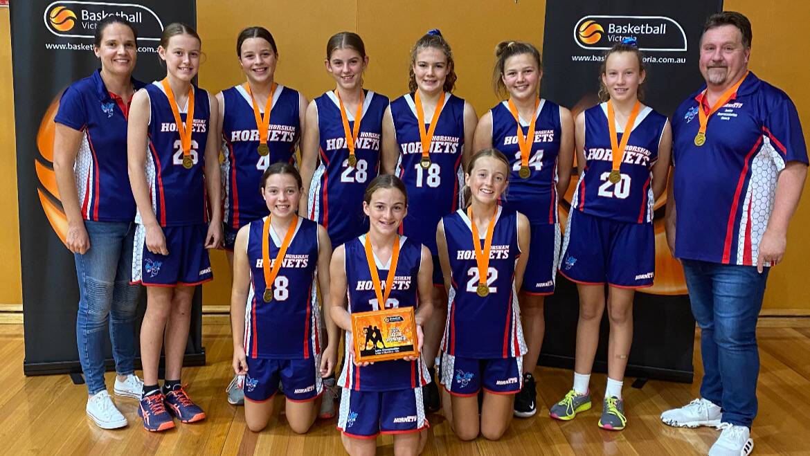 WINNERS: The Horsham under-14 girls' side are all smiles after taking out the Division Three Country Championship. Picture: KARA FLANIGAN REINHEIMER