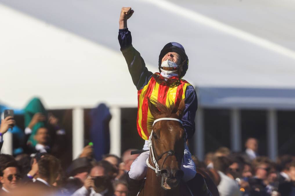 SALUTE: Jockey James McDonald looks to the sky after Nature Strip won 2021 The Tab Everest at Royal Randwick Racecourse on October 16, 2021 in Sydney, Australia. Picture: MARK EVANS/GETTY IMAGES