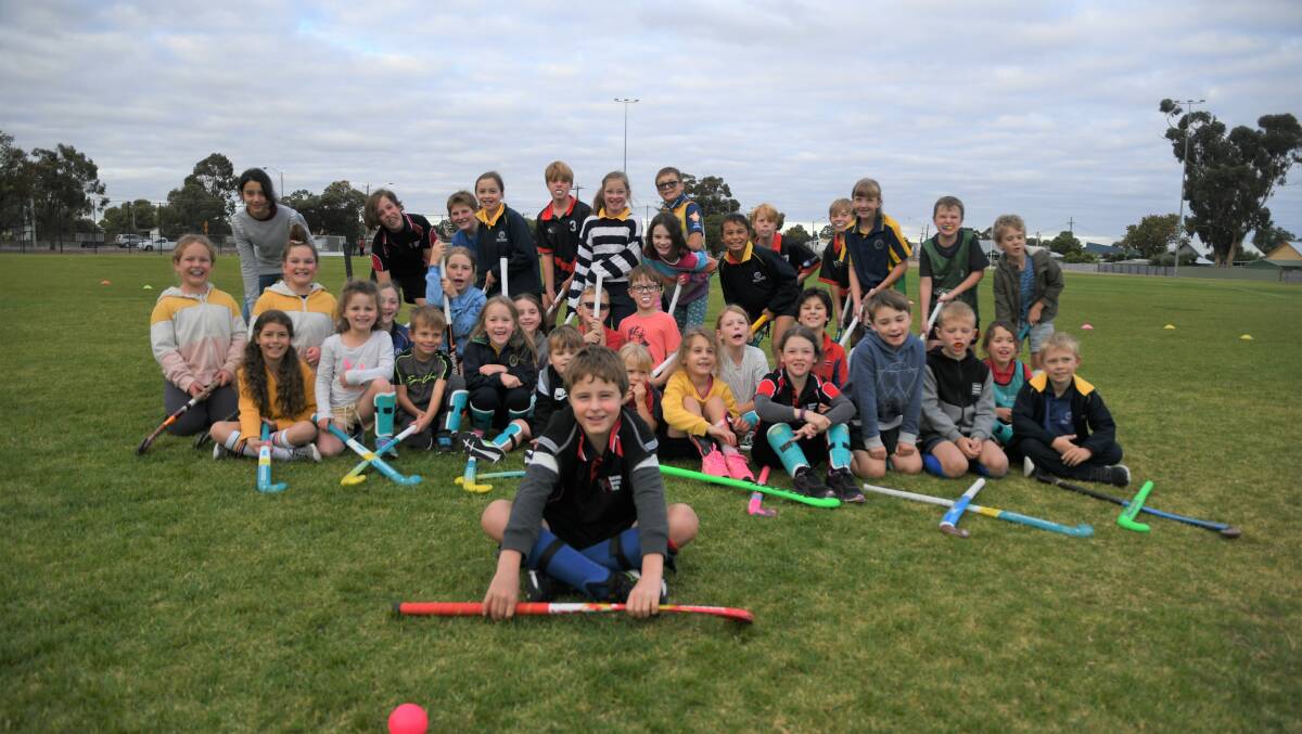 SAY CHEESE: Horsham's Hookin2Hockey participants pose for a photo. Picture: MATT HUGHES