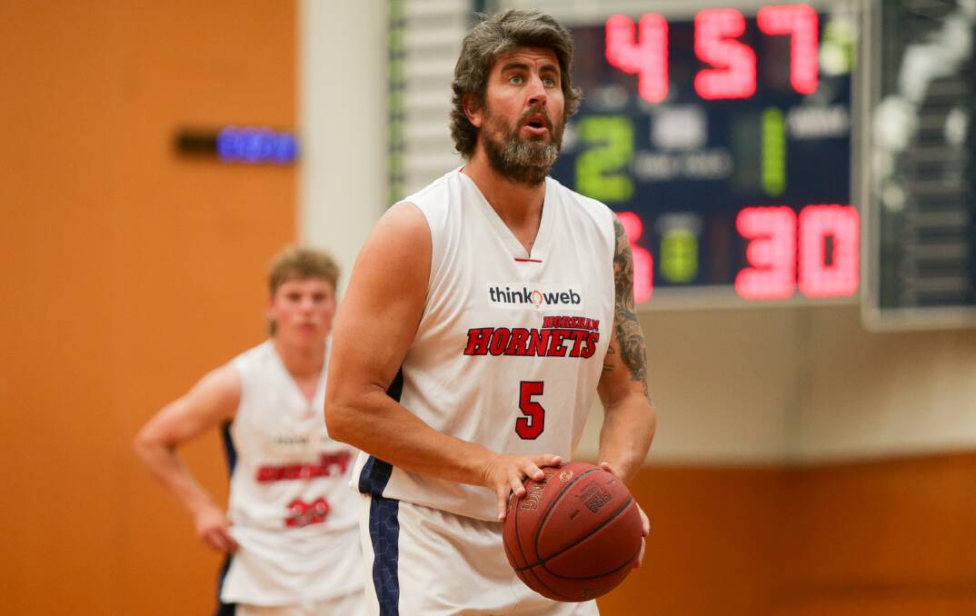 FOCUS: Wade lines up a free-throw against Warrnambool in 2021. Picture: CHRIS DOHENY