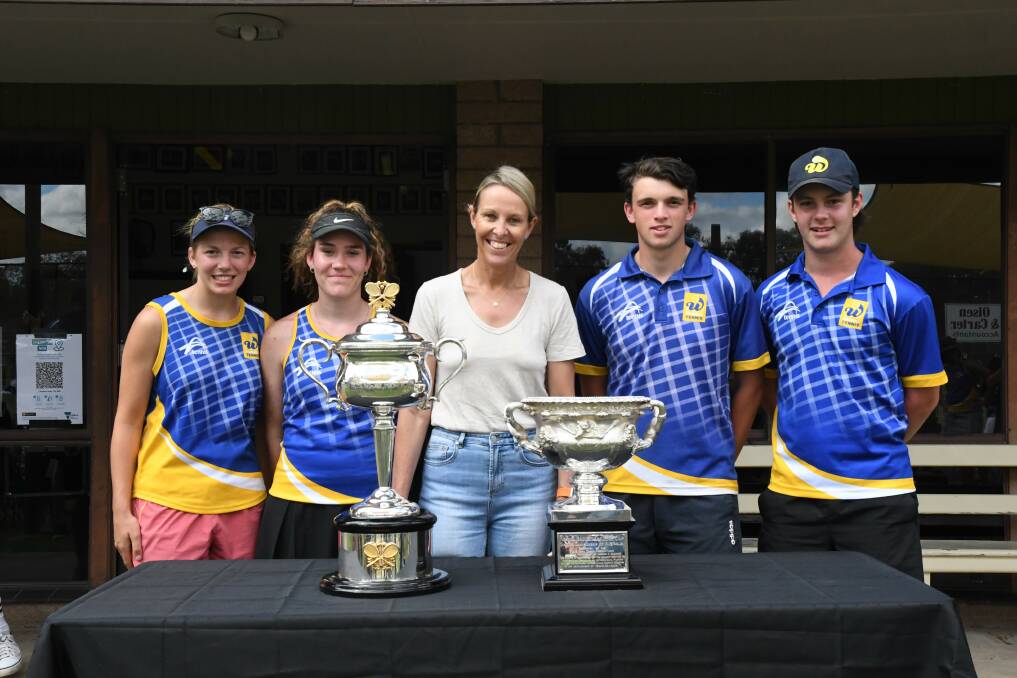 TROPHIES: Wimmera tennis players Emily Polack, Blair Penrose, Connor Chivell and Joel Rees with former world no.25 Nicole Bradtke with the Australian Open trophies. Picture: ALEX BLAIN