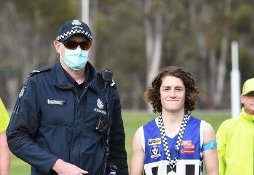 FUTURE STAR: Tyler Pidgeon photographed receiving his award from Murtoa Police Officer First Constable Steven Carrig at Murtoa. 
