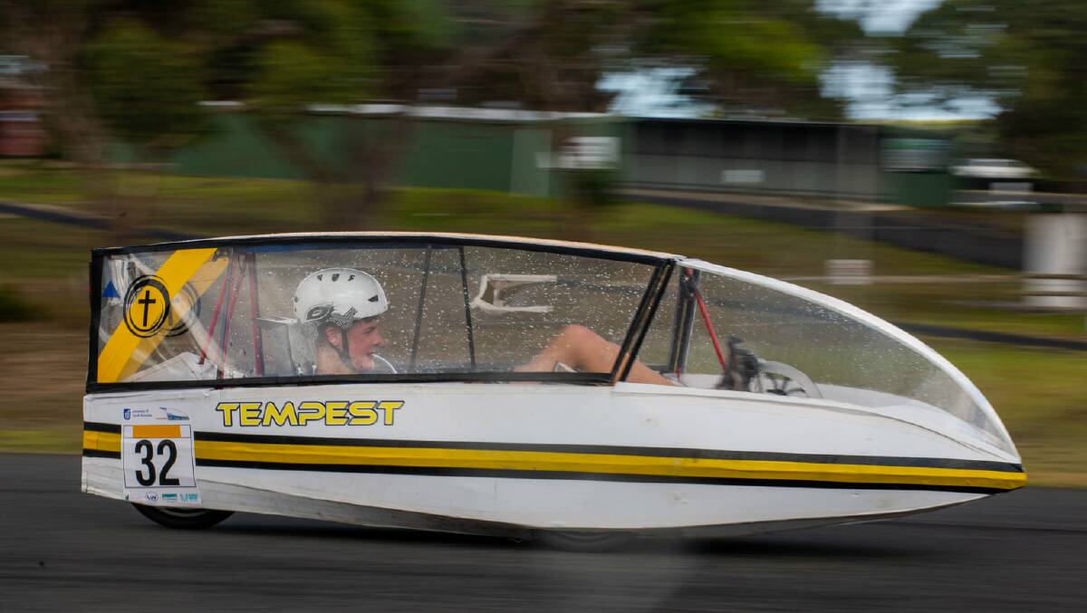 FLYING: Holy Trinity's Year 8-10 boys trike Tempest whizzes past during a race. Picture: CONTRIBUTED