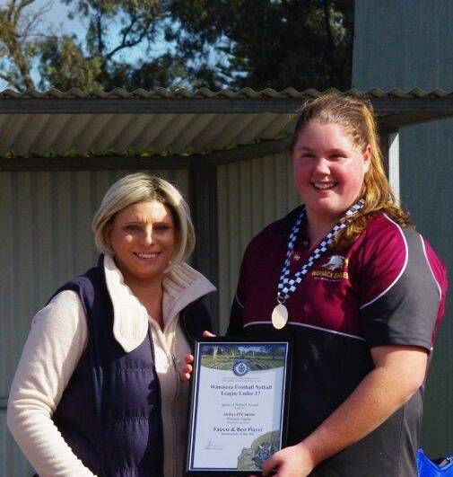 RISING STAR: Amber O'Connor receiving her award from Warracknabeal Police Officer Sergeant Kylie Newell. 