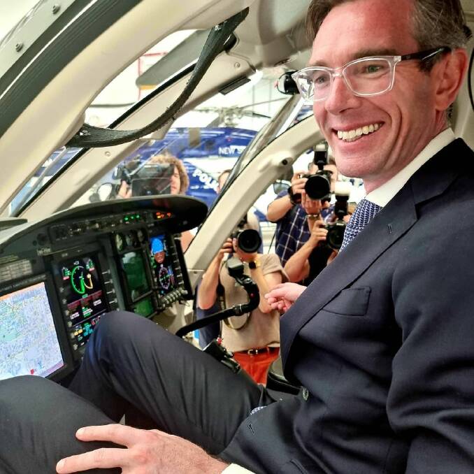 NSW Premier Dominic Perrottet sits inside one of the helicopters. He said "these dollars and investments in the NSW Police Force are incredibly important". 