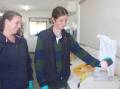 WORK EXPERIENCE: BCGs Ash Tierney with Birchip P-12 work experience student Sassia Coffey. Picture: CONTRIBUTED