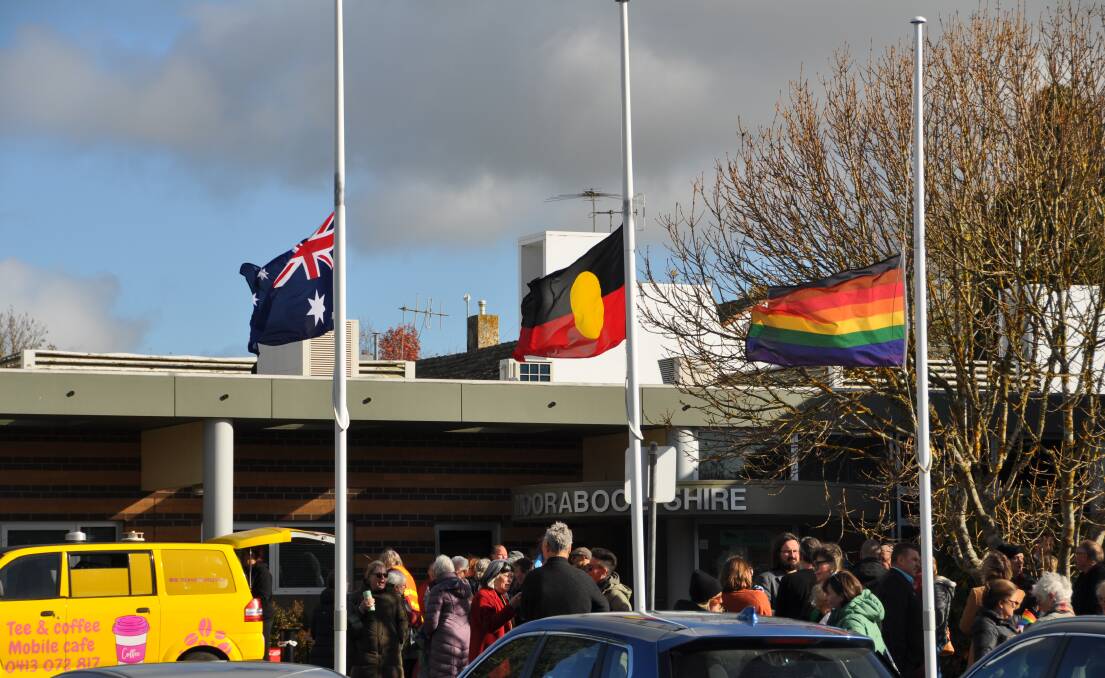 Moorabool Council marked its first IDAHOBIT flagraising at Ballan on Wednesday, with flags at half mast in line with a State Funeral in Melbourne. Picture by Gabrielle Hodson.