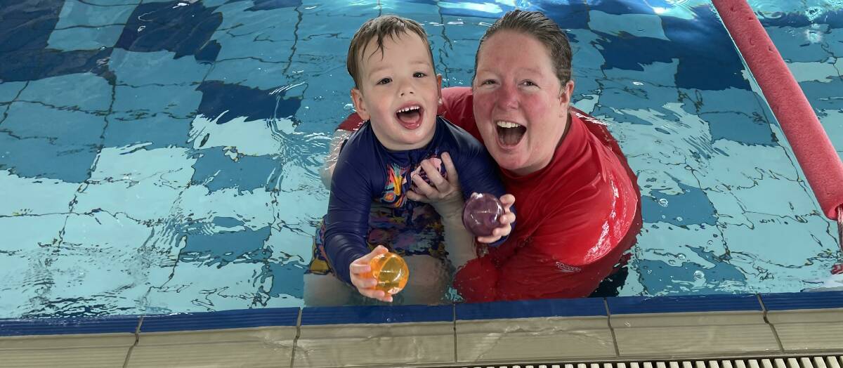 Harry is enjoying his one-on-one swim lessons with trainer Michelle. Picture by Sheryl Lowe
