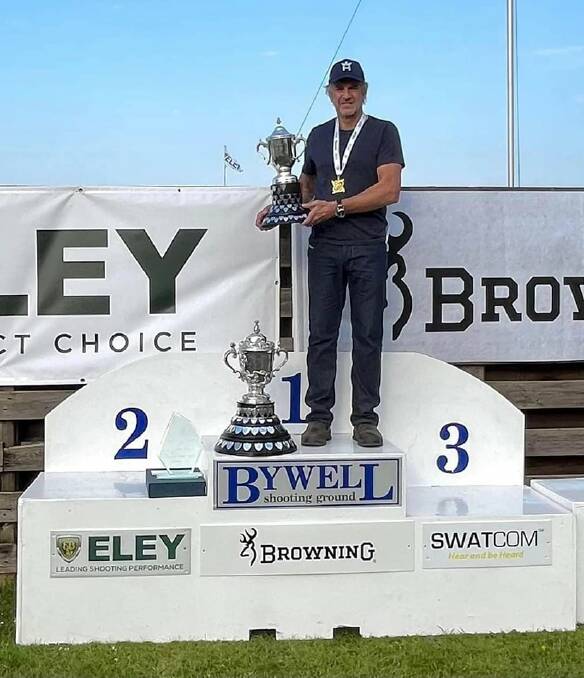 Former Horsham High School student, Mr Andrew Cameron with the winners trophy for Overall High Gun of the English Open Trophy. Picture by Krieghoff Australia