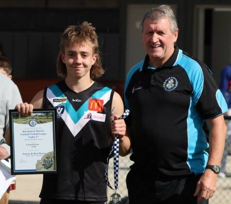 Swifts' Lachie Kenyon was presented with the round two Horsham and District Football Netball League Spirit of Football award by Blue Ribbon Foundation member Les Power. Picture supplied. 