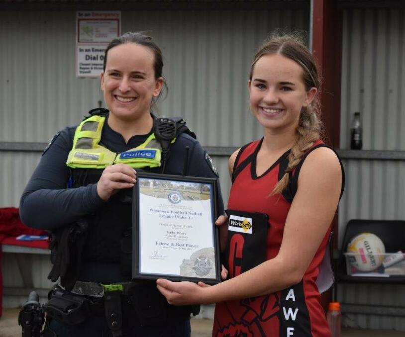 Stawell Warriors netballer Ruby Peters was presented her Blue Ribbon Foundation Spirit of Netball award by Stawell police officer Constable Amy Stubberfield. Picture supllied