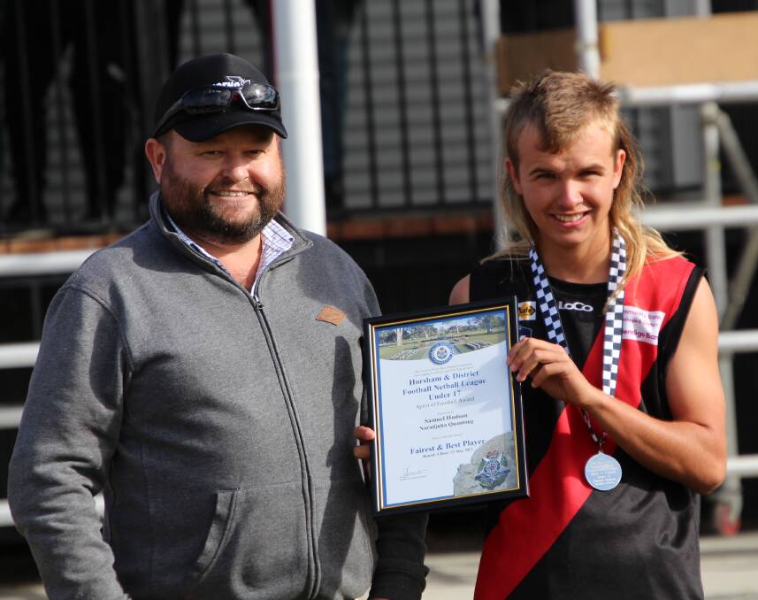 Noradjuha Quantong's Samuel Hudson was presented with his Blue Ribbon Spirit of Football award by Horsham police officer, Senior Constable Andrew Gardiner. Pictute supplied