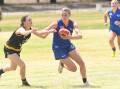 Elle Treloar takes on a defender during the Horsham Demons' practice match against Lake Wendouree at Dock Lake Reserve on Sunday, February 18. Picture by Lucas Holmes