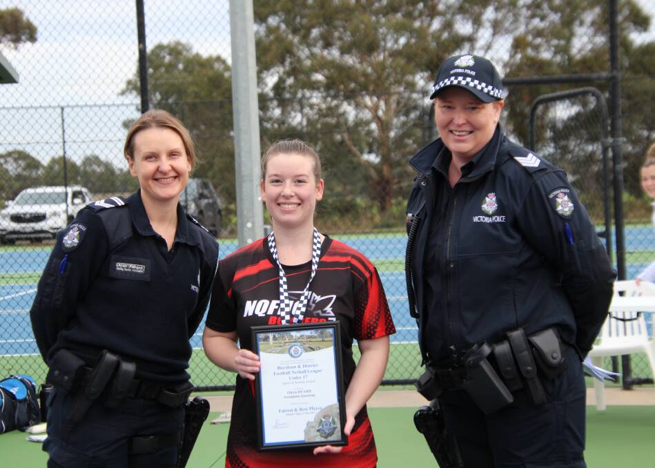 Noradjuha Quantong's Olivia Heard is presented her Blue Ribbon Foundation Spirit of Sport award by Horsham police officers Leading Senior Constable Teilah Rabone and Sergeant Veronica Dempsey. Picture supplied