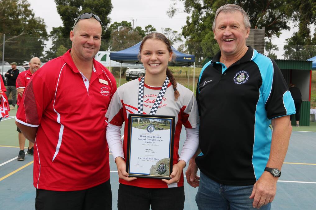 Round one HDFNL Sprit of Netball winner Lilly Weir of Taylors Lake Football Netball Club pictured with club President Travis Mackley and Horsham Blue Ribbon Member Les Power. Picture supplied. 
