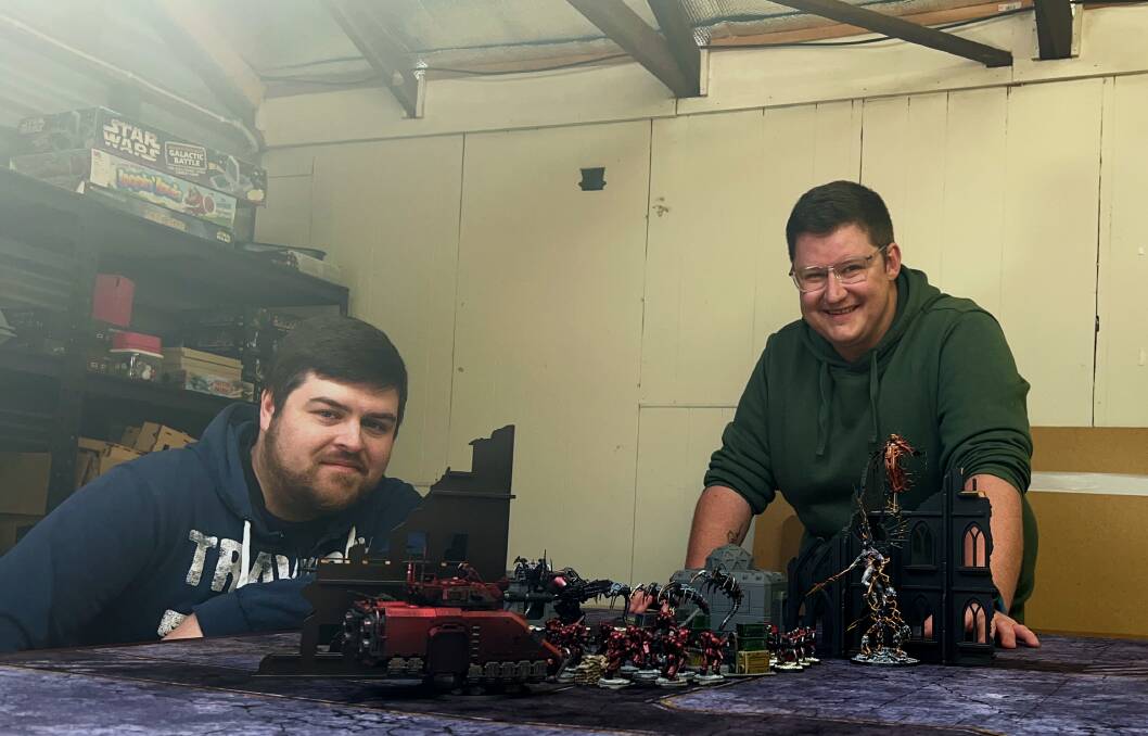 Horsham Warhammer members, Josh Brown and Josh Sykes display what a Warhammer game. Picture by John Hall