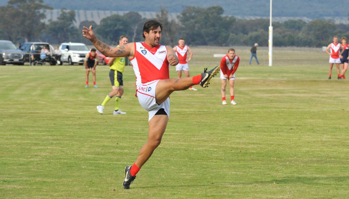 Taylors Lake's Jayden Clayfield kicks for goal against Laharum in round four of the HDFNL Picture by John Hall