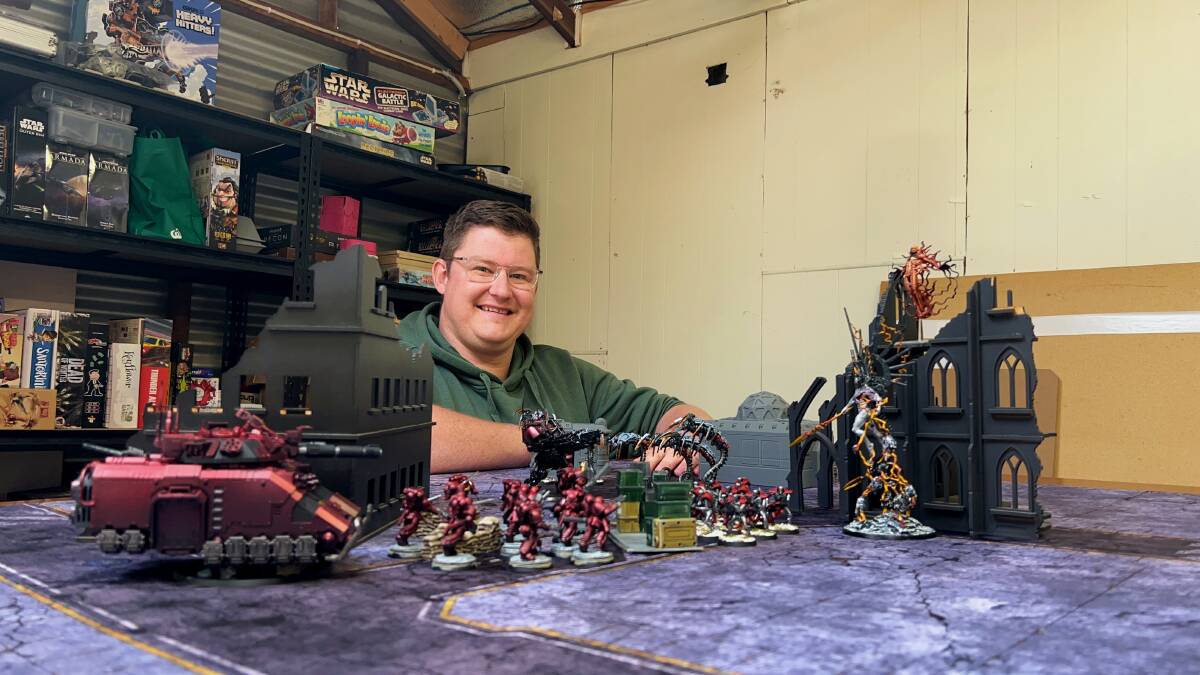 Horsham Warhammer member, Joshua Sykes, displaying what a warhammer battlefield can look like during a game. Picture by John Hall