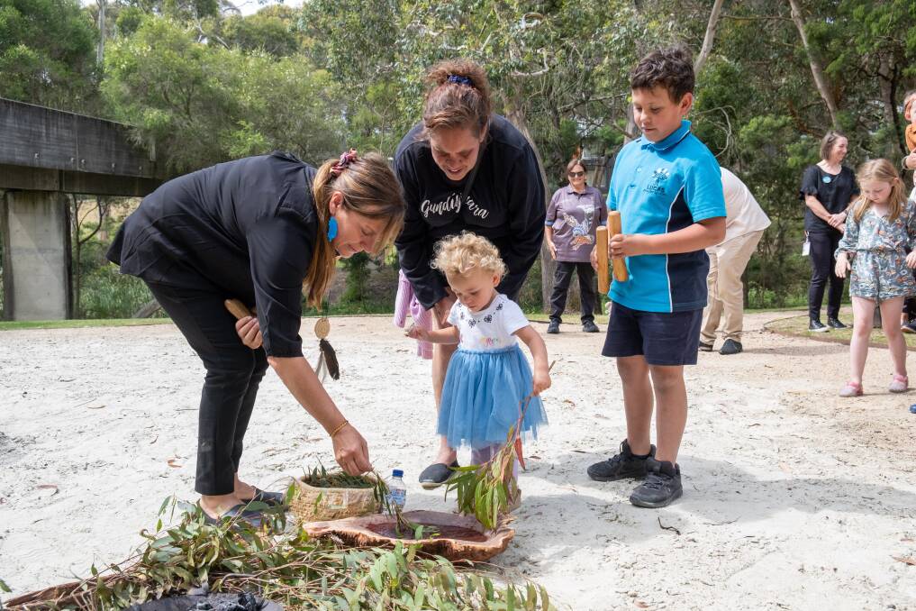 Tammy Gilson, Waddawurrung woman Alinta Edwards, Guditjamara Daughter Natalie Wandin and Son James Wandin at a traditional smoking ceremony hosted by Grampians Health last year in Ballarat for babies born in 2022. Picture supplied