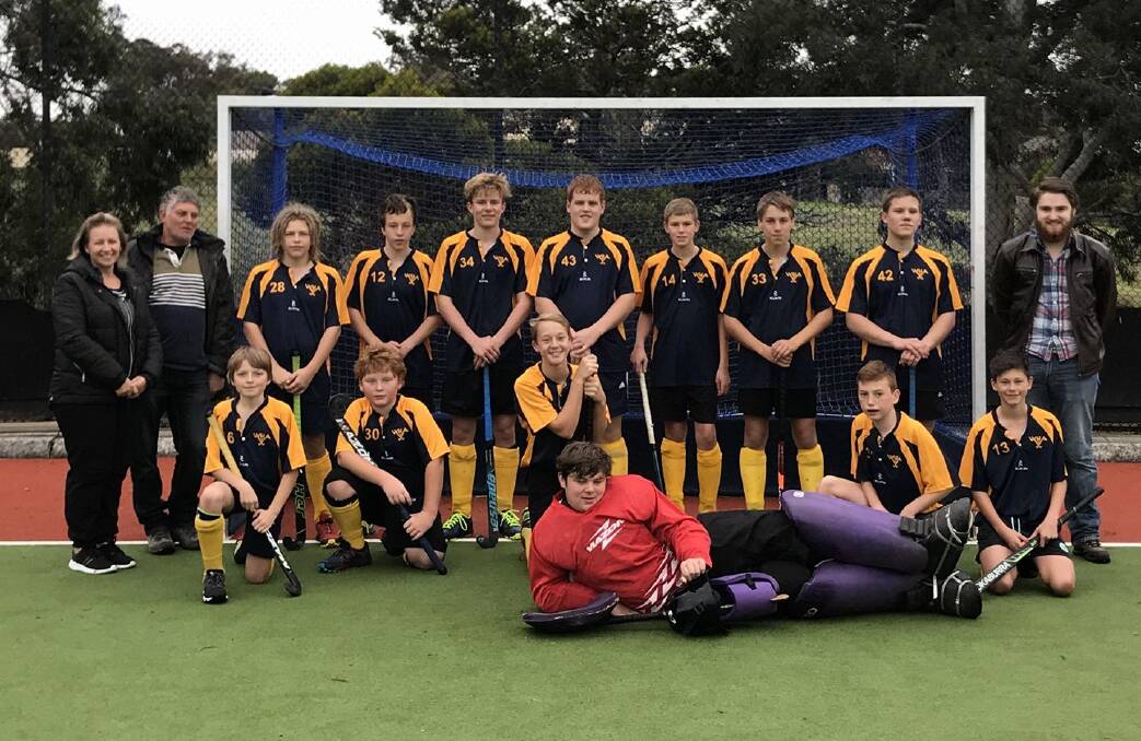 EXPERIENCE: The U15 Boys with team manager Sharon Croot, assistant Trevor Krelle and coach Jack Dean gained valuable playing time which will stand them in good stead in the local competition.