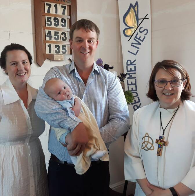 MILESTONES: Sarah and Brad Ellis with baby Henry and Rev. Linley Liersch. Both Brad and Henry were baptised on this occasion. Brad also took his confirmation.