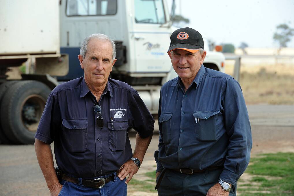 DEDICATION: Brothers Colin Moore and Jeff Moore at a Wimmera Machinery Field Days working bee in 2012. Colin joined the committee in 1966 and Jeff joined in 1978.