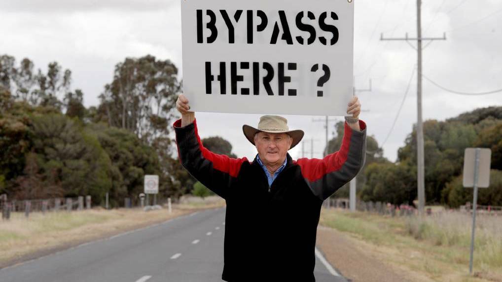 One Horsham bypass group member Lance Trigg demonstrates against on of the Horsham bypass option routes in 2014 Picture: SAMANTHA CAMARRI