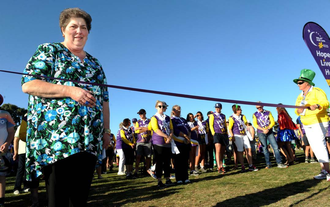 HONOUR: Survivor Maria Marchesini cutting the ribbon at Horsham and District Relay For Life on Friday. Picture: OLIVIA PAGE