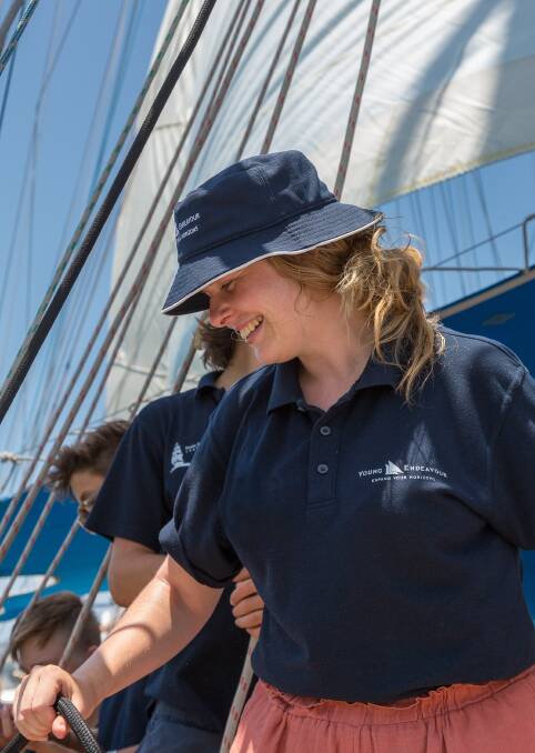 Jess Hill working hard and smiling big on board the Young Endeavour.