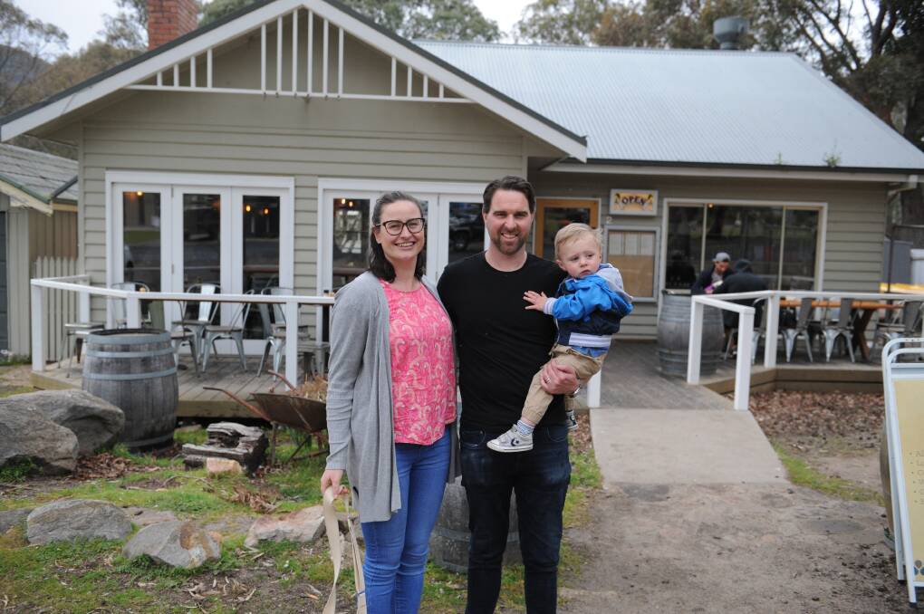 Halls Gap's Harvest cafe owners Carly and Richard Flecknoe with son Joseph in October. Cafes, retail stores and more can join in our Business Hour on Facebook on Wednesday night.