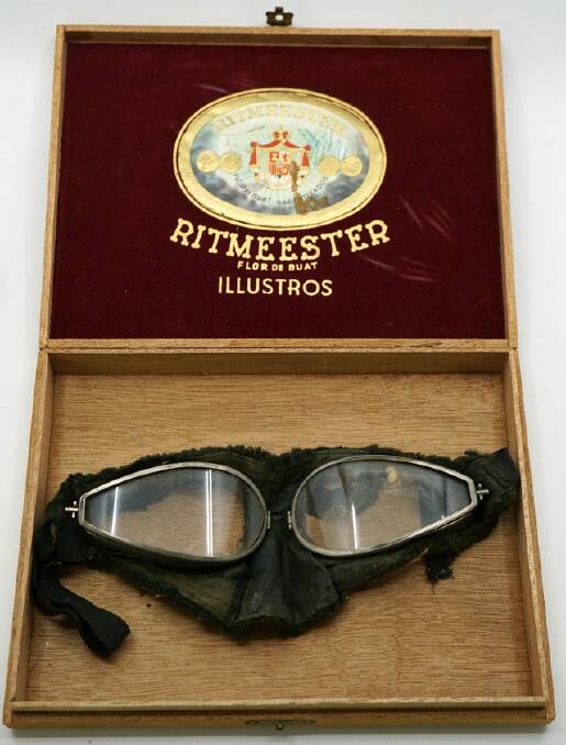 Vintage driving goggles in original wooden box.