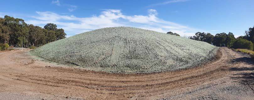 A "cell" of PFAS contaminated soil was heaped up at Williamtown in NSW.